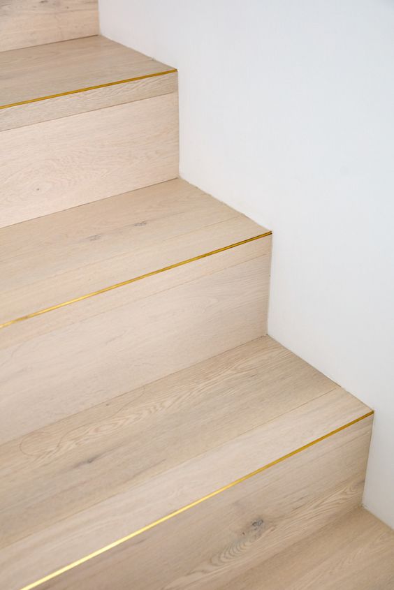 light tone stair nosing with golden trims
